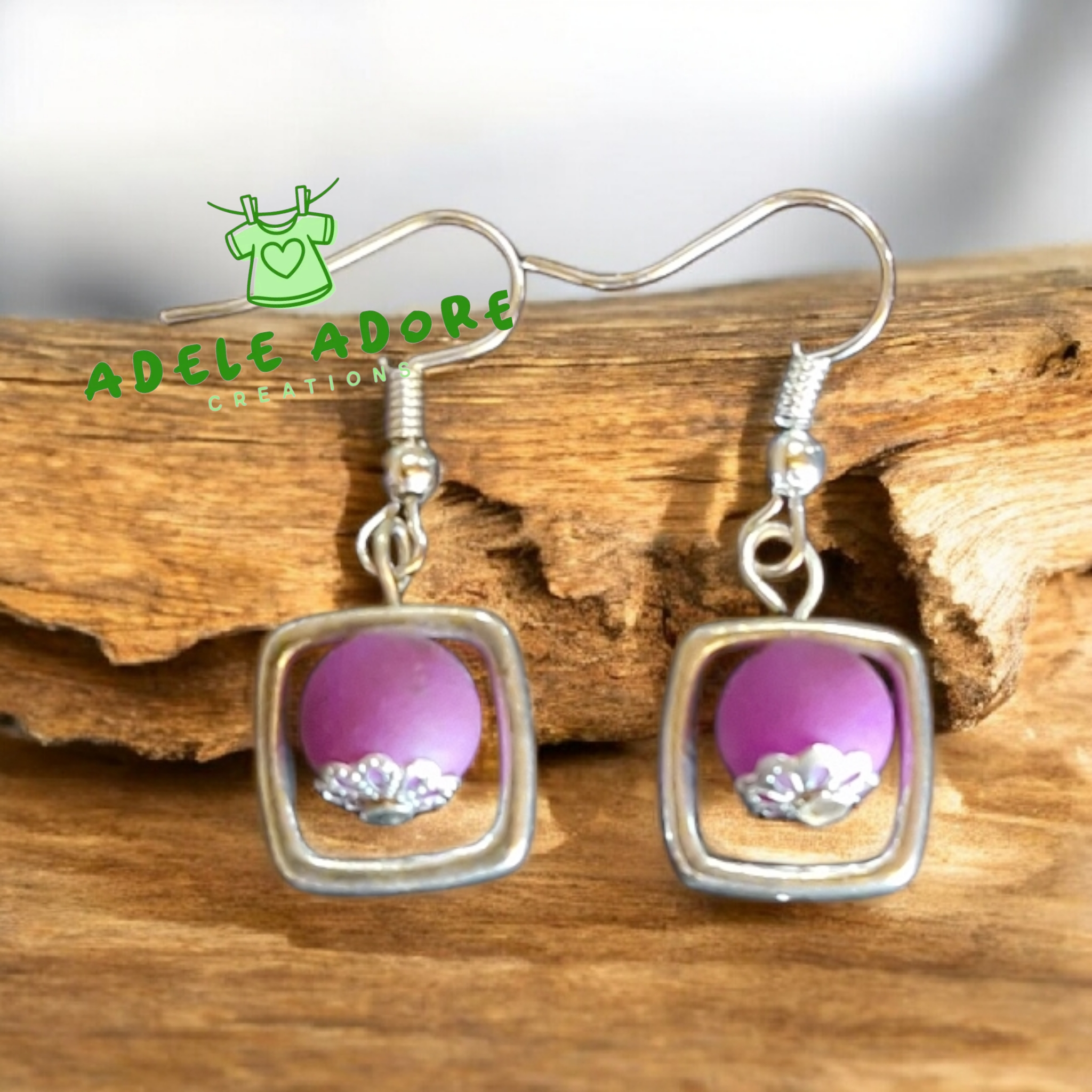 Purple and silver drop style earring