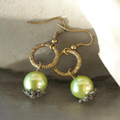 Green pearl drop earrings