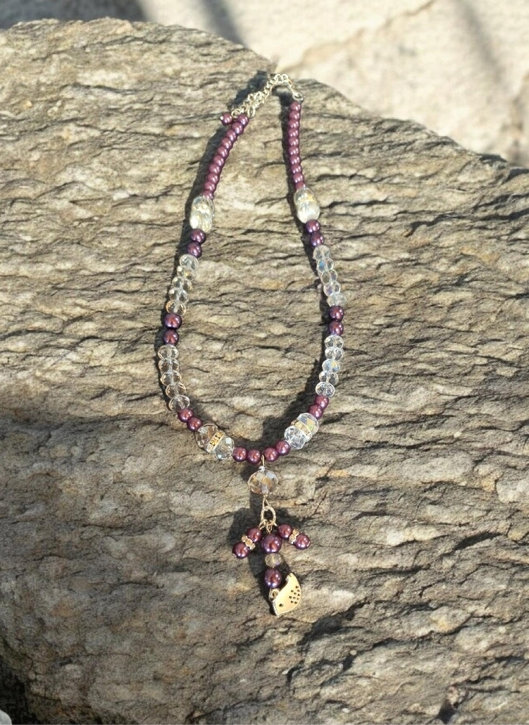 Purple glass pearls and faceted glass crystal necklace with silver bird cluster feature
