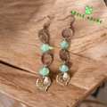 Green and antique gold drop style earring