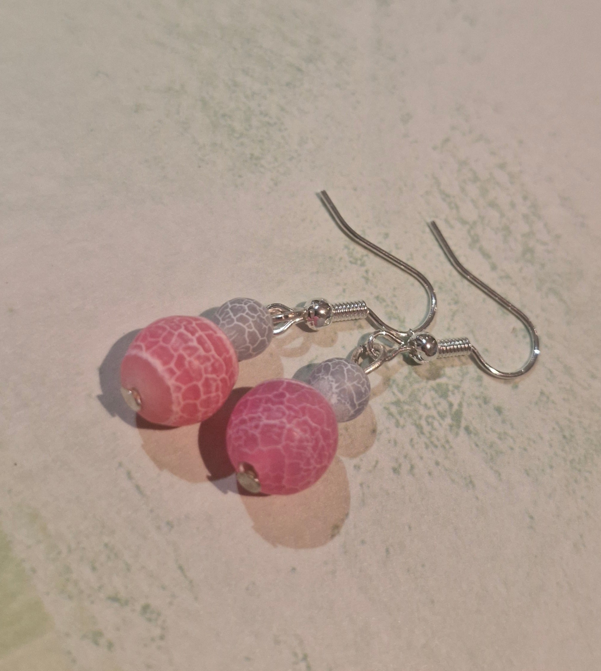 Pink and purple round beaded earrings