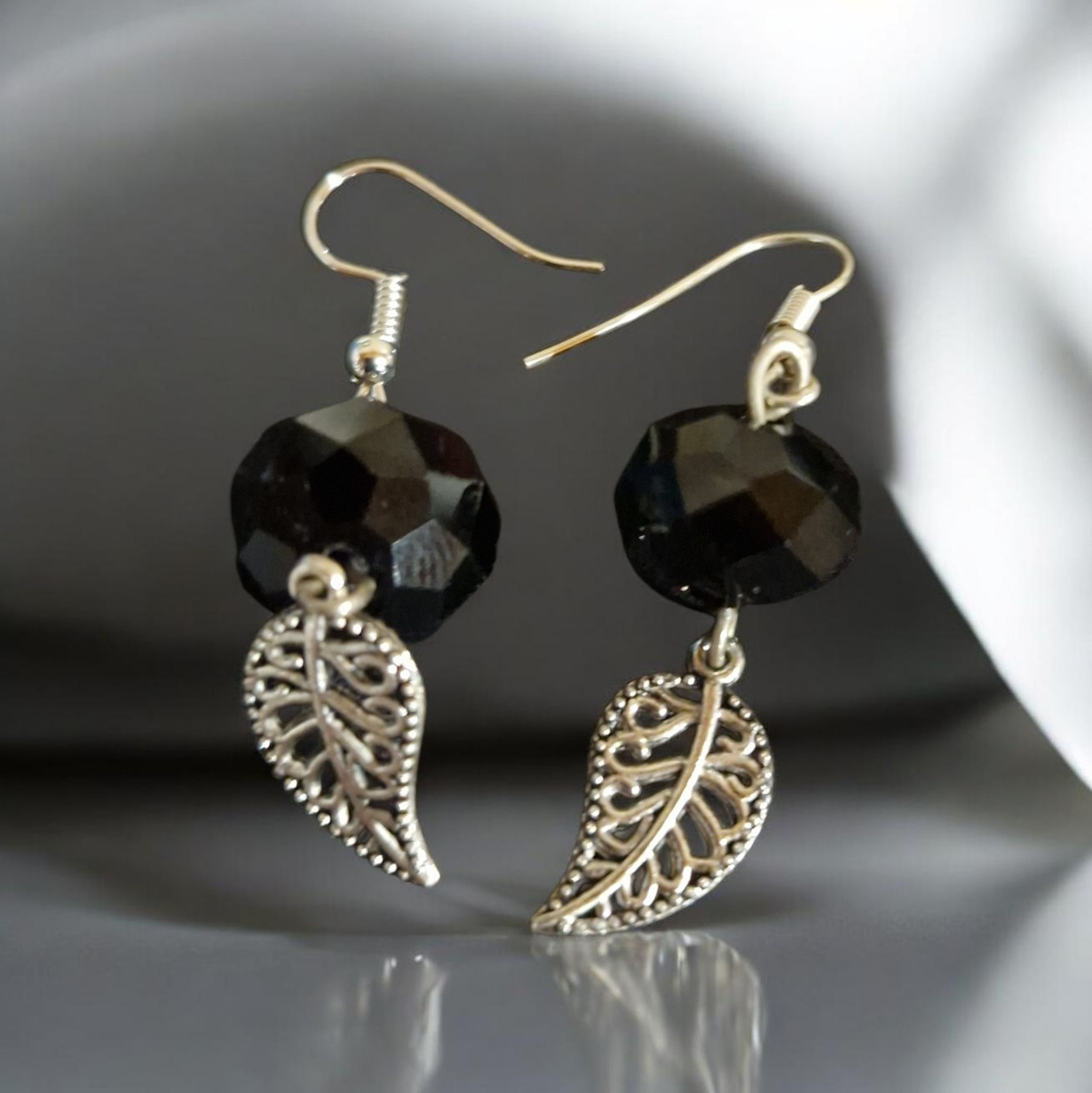 Filigree leaf and crystal earring
