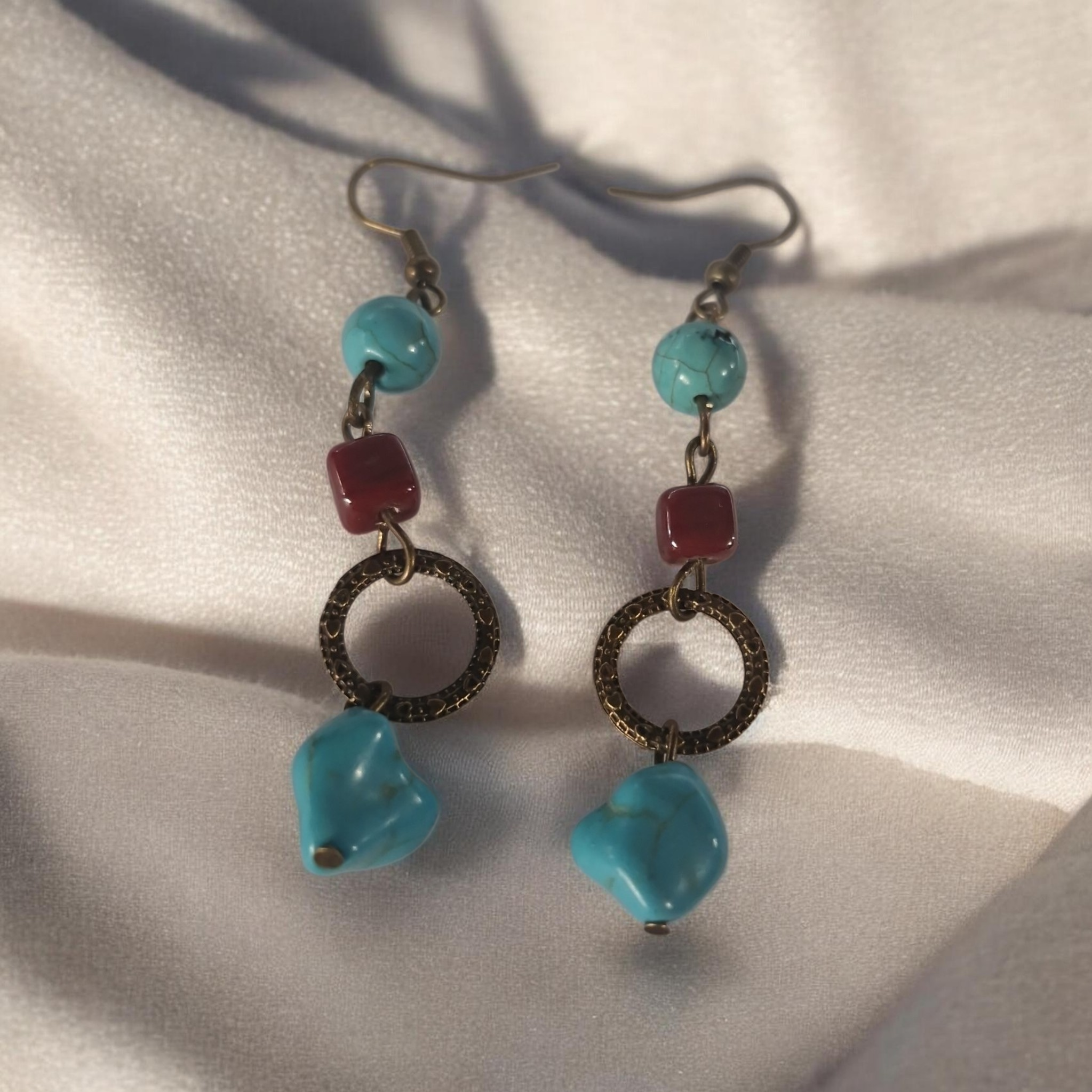 Teal nugget decorative earrings