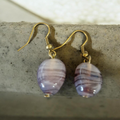 Striped glass nugget bead on gold coloured earwires