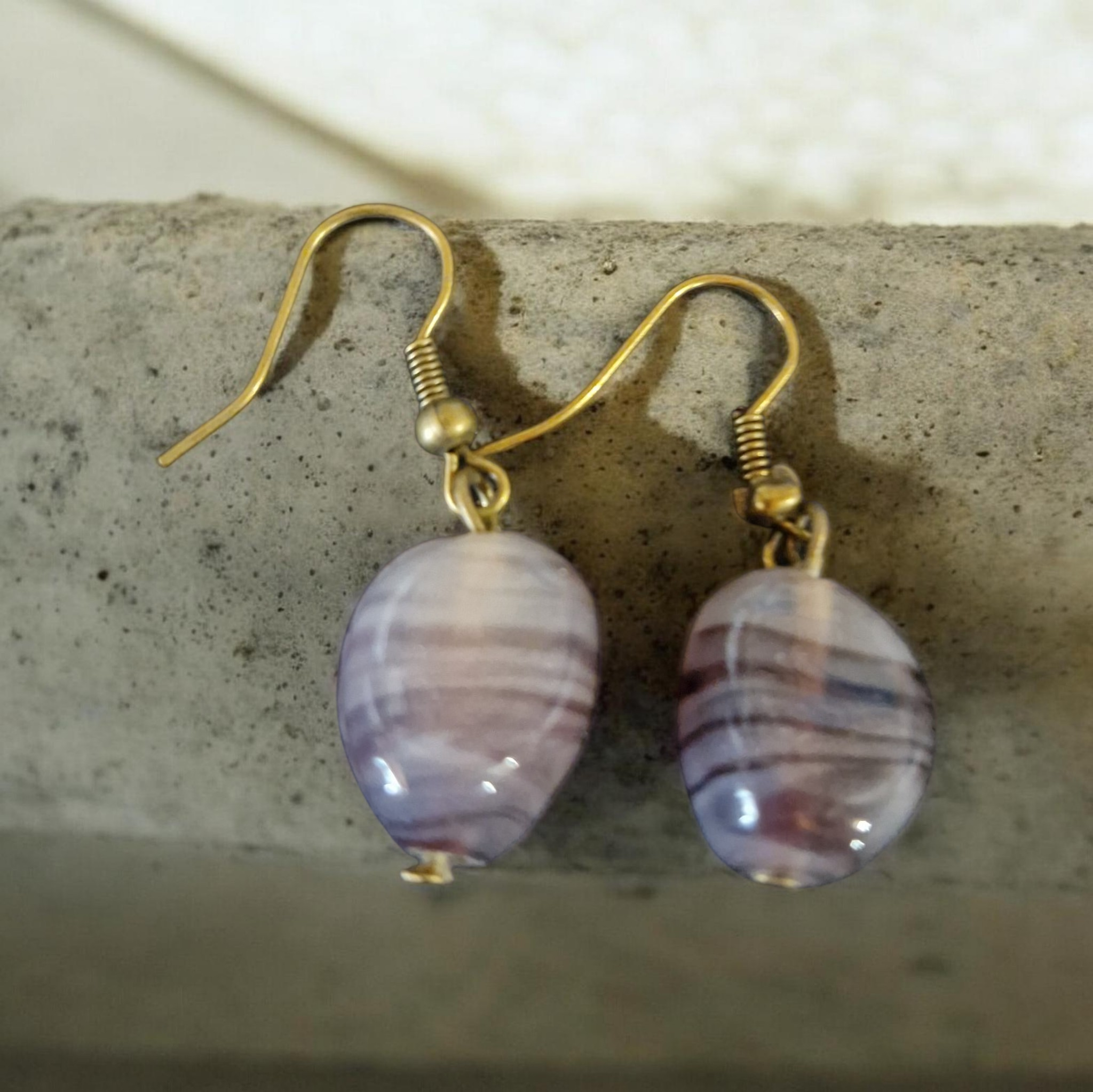 Striped glass nugget bead on gold coloured earwires