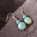Round howlite feature earrings